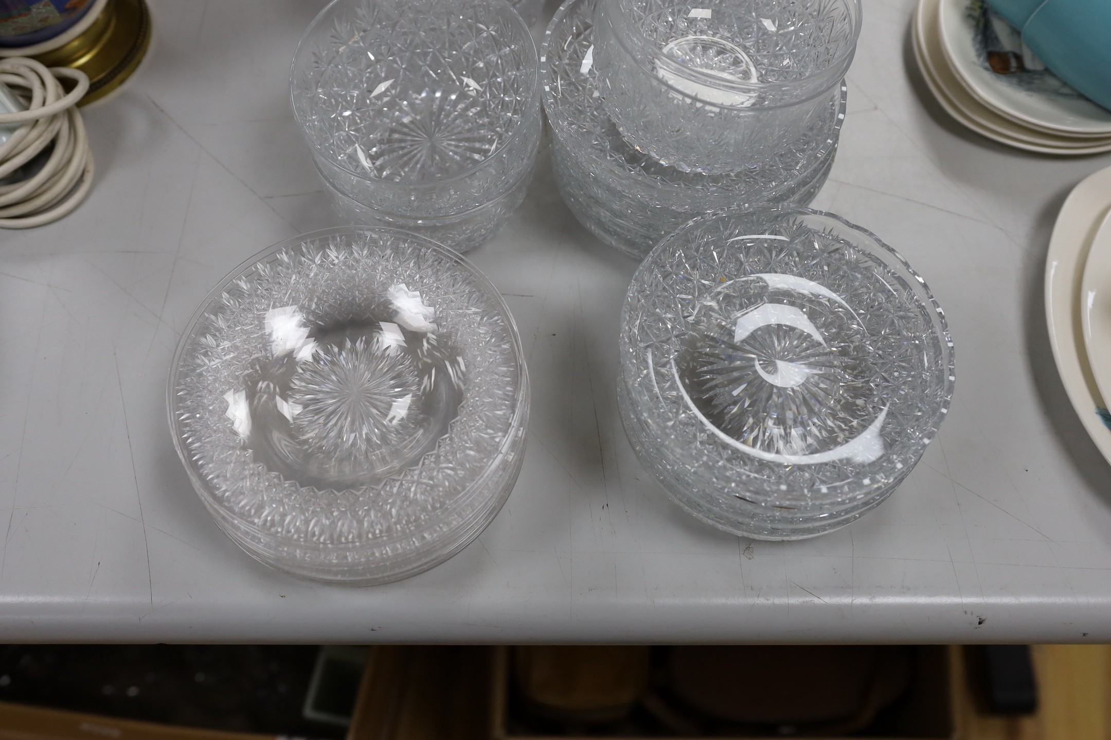 A quantity of Thomas Webb cut glass rinser bowls and dishes together with a pair of glass vases etc